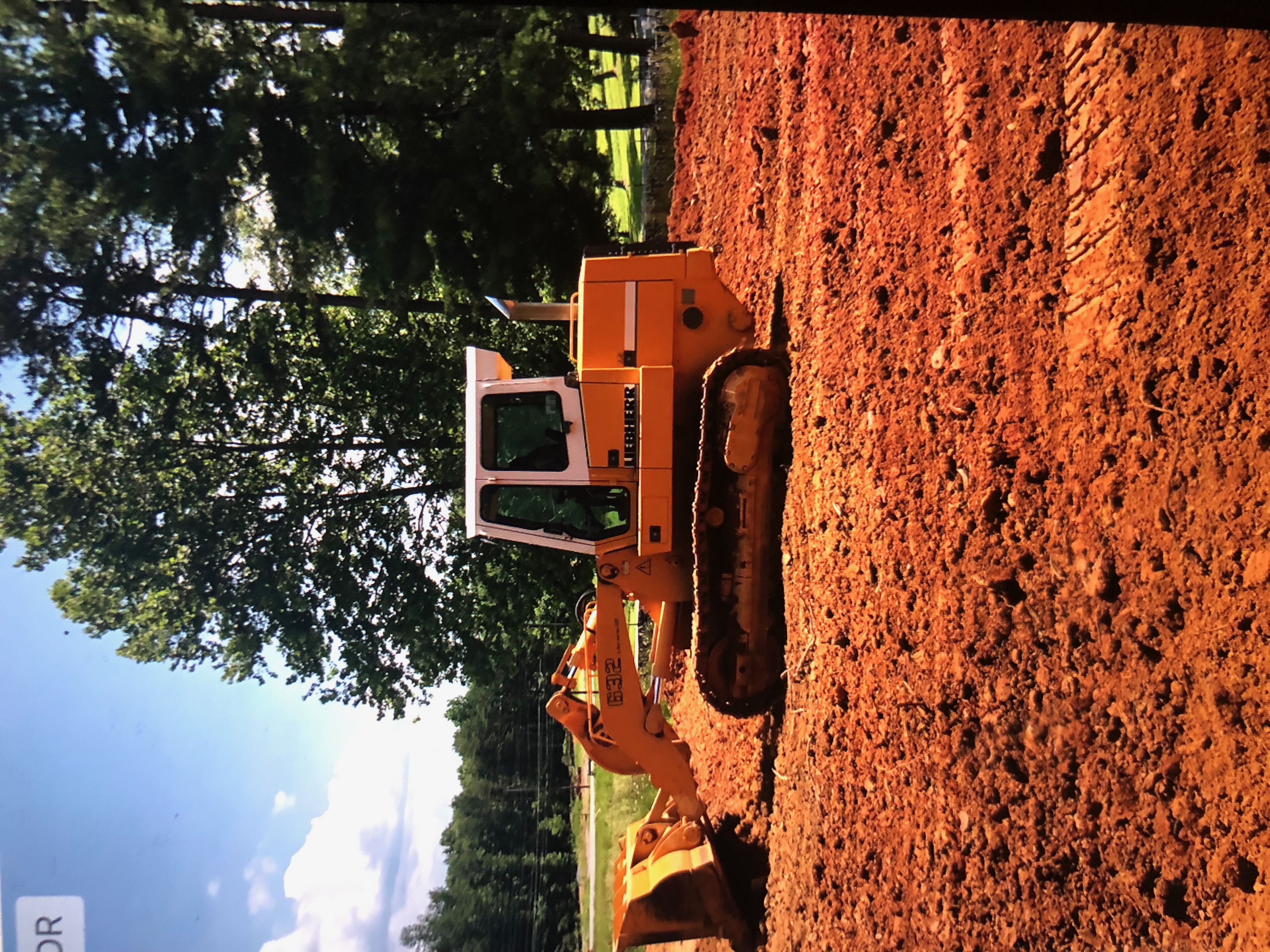 Land grading with bulldozer